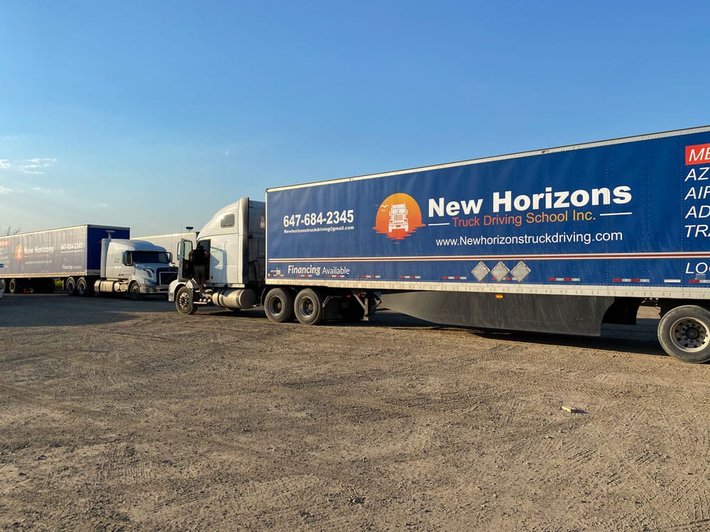 Volvo tractor coupled to full-size branded trailer